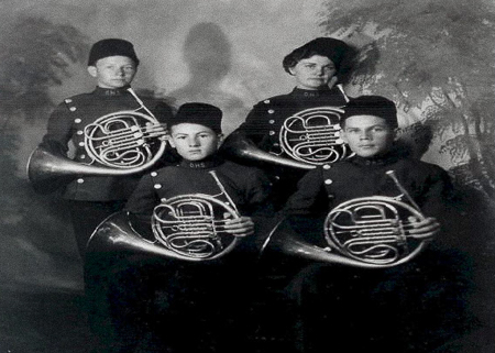 French horn players in Cossack style Uniforms